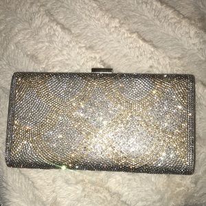 Glitzy rhinestone clutch with gold shoulder strap